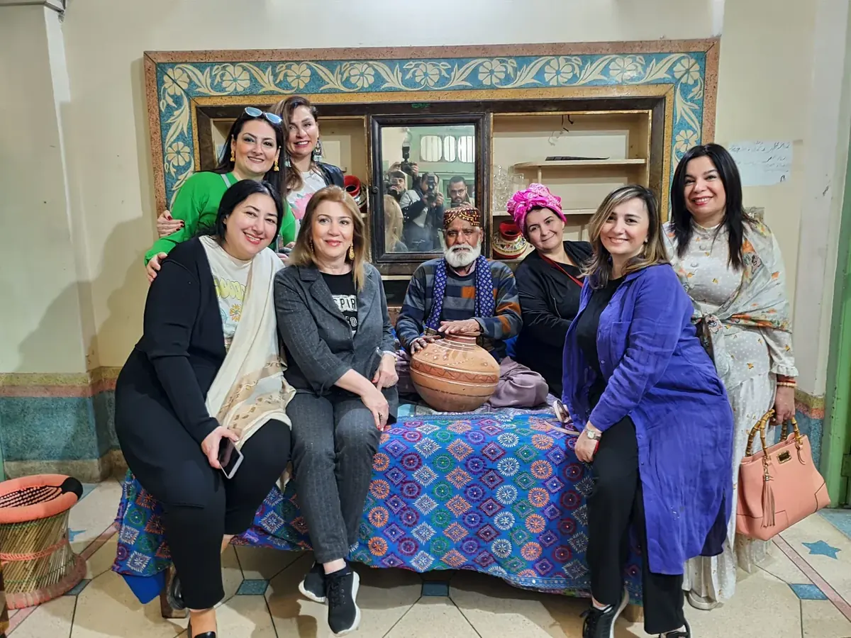 International guests meeting a local artisan during a Lahore cultural tour